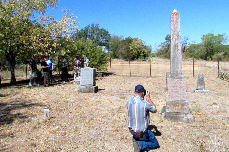 Great-great-grandson Ron Fox takes a picture of the obelisk.